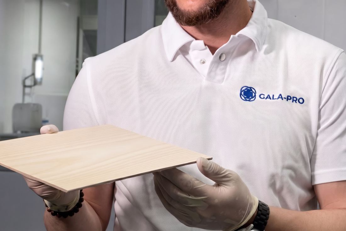 GALA-PRO technologist with a finished wood panel